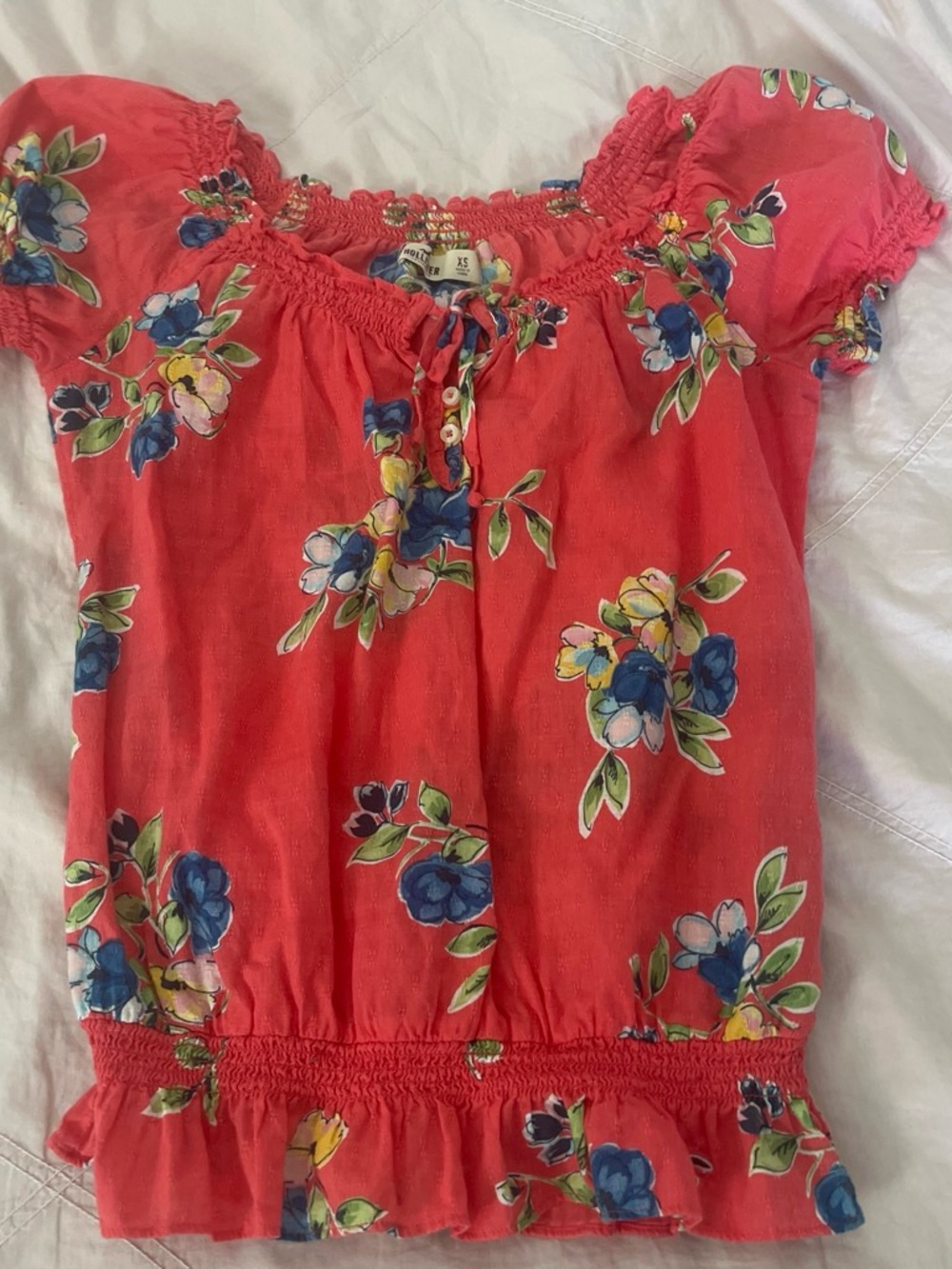 Hollister Coral Smocked Floral Blouse with Blue & Yellow Accents